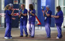 'We love you NHS': UK health service gears up for virus peak