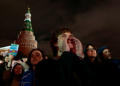 On Putin's birthday, opposition activists protest, call for him to quit