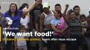 Hours after mass escape, migrants demand food, freedom