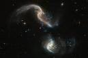We're all going to die one day, much like these two merging galaxies