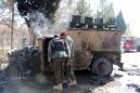 Emboldened Taliban capture key southern district