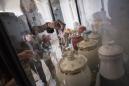 Stacks of Urns in Wuhan Prompt New Questions of Virus’s Toll
