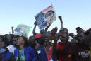 Few turn out as Mugabe is returned to a Zimbabwe in crisis