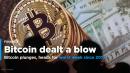Bitcoin falls 30 percent, posts worst week since 2013