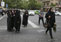 Assault on woman by Iranian cops sparks headscarves debate