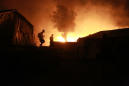 Fire destroys refugee camp on Greek island, leaves thousands homeless