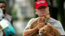 FAKE MEOWS: Trump Fans Share Bogus Snap Of Him Saving Cats From Harvey