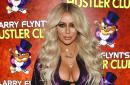 Aubrey O'Day claims flight attendant forced her to 'undress in front of the entire plane'