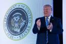 '45 is a puppet': Can you spot the mistakes in the fake presidential seal behind Trump?