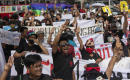Anti-government protesters in Thailand tussle with police
