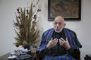 Afghanistan's Karzai tells AP that US cash fed corruption