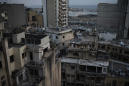 A week after blast, Beirut pauses to remember the dead