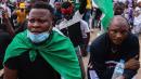 Nigeria protests: Millions placed under curfew as violence spreads