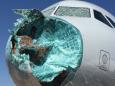 Plane plunges 'like a rollercoaster' as nose and windows destroyed by hail in thunderstorm
