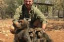 Calls for Idaho wildlife official to resign after baboon hunting picture surfaces