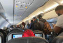 Q&A: Why some planes are crowded even with air travel down