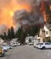California wildfire burns at least two dozen homes in small mountain town