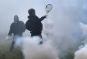 Dawn clashes as French police clear anti-capitalist camp