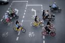 China starts regulating bike-sharing as complaints soar