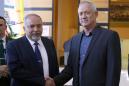 Netanyahu's chief rivals in Israel unite in bid to unseat him with coalition government