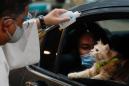 Pandemic prompts drive-through pet blessing in Philippines