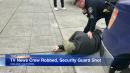 California news crew robbed, guard shot; suspect arrested