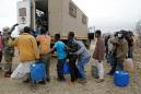 Zimbabwean shoppers rush into S.Africa as borders open