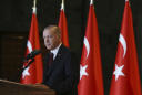 The Latest: Erdogan hails Turkey-US efforts on Syria zone