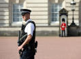 Man with sword injures police outside UK Queen's palace