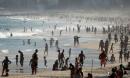 Brazilians flock to beach as WHO says country undercounting coronavirus surge