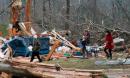 Alabama tornado: rescuers continue search after twister kills 23