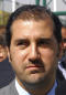 Cousin of Syria's Assad faces legal action over telecom debt