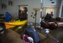 Family returns to home near Houston to assess damage after Harvey flooding