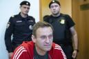 Kremlin critic Alexei Navalny blames Putin for poisoning, threatens lawsuit against spokesman