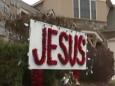 Family asked to remove 'offensive' Jesus sign from their Christmas display because it offended a neighbour