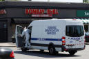 Canada police seek suspects in restaurant bombing, 15 injured