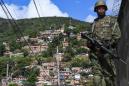 Brazil troops storm Rio slums to catch gang leaders