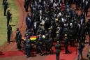 Zimbabwe's Mugabe honored at state funeral, burial delayed