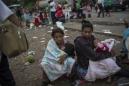 The Latest: Caravan splinters as it heads through Mexico