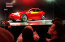 Tesla debuts $35,000 Model 3, sees loss in first quarter