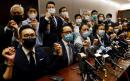 Mass resignations as Hong Kong ousts four pro-democracy lawmakers