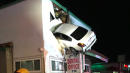 Car Flies Into Second Floor Of Building And Stays There