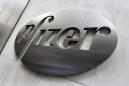 Pfizer, riding tax changes, puts up huge 4Q profit
