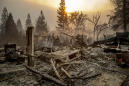 The Latest: Fire captain says wildfire destroys Calif. town