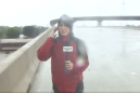 Incredible moment reporter helps rescue man caught in Harvey floods, live on TV