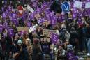 Tens of thousands march in France, Italy to protest femicide