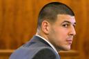Ex-NFL star Hernandez hangs self in prison; family seeks probe