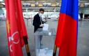 Russians cast early votes in ballot to extend Putin's rule