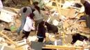 Family Dog Walks Out Of Rubble After 5 People Killed in Tornado, Deadly Floods