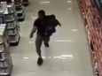 Off-duty police officer shoots armed robbers dead while holding baby in other arm